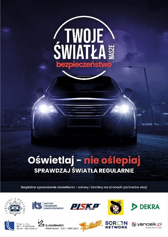 Plakat z napisem twoje światła nasze bezpieczeństwo i auto z włączonymi światłami mijania.